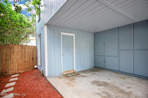 Walkway to fenced backyard Walkway to fenced backyard