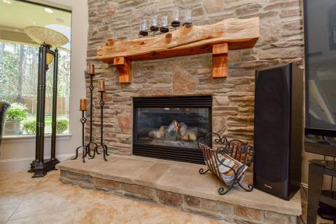 Gorgeous floor to ceiling stone fireplace.