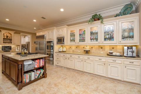 This kitchen has lots of counter space and cabinets.