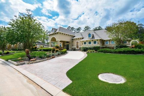 Circle driveway leads up to the front door.