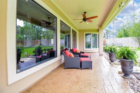 Quiet covered sitting area outside of living room.