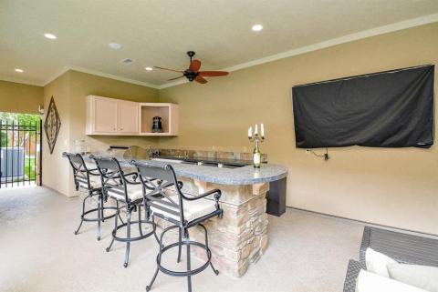 Outdoor kitchen area and bar