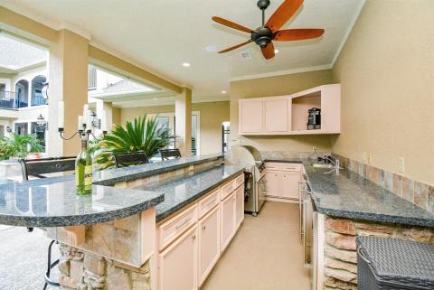 Outdoor kitchen area has two outdoor refrigerators and ice maker that were replaced in 2020.