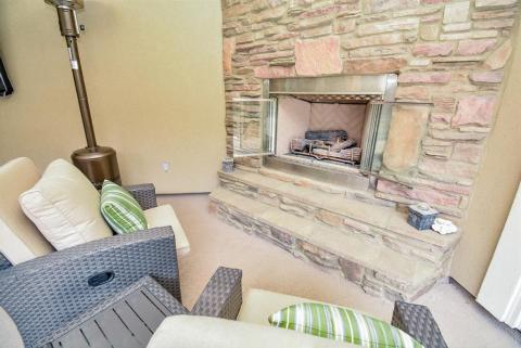 This outdoor fireplace is the perfect place to sit and catch up