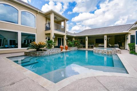 Check out this amazing pool! Saltwater Pebble Tec and its heated!