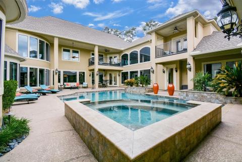 This true resort style pool is located in the middle of the home. Its is a must see!