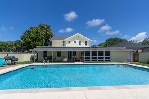 Sought after Denver Court area.  This 4BR 5 Bath with a 2-car tandem garage and saltwater pool is on a corner lot with mature Magnolia trees and a luscious lawn.
