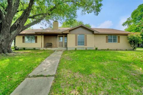 Front of home with gorgeous view of the water