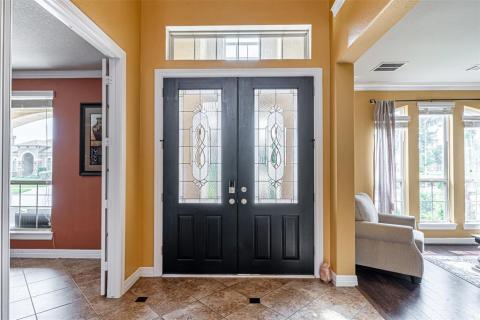 As you can see a large foyer exiting the home. As you can see a large foyer exiting the home.