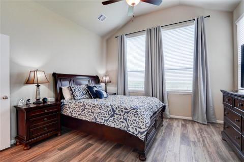 In the evenings, withdraw to the spacious owner's retreat complete with a vaulted ceiling, tile floors, and windows that let in lots of natural light.