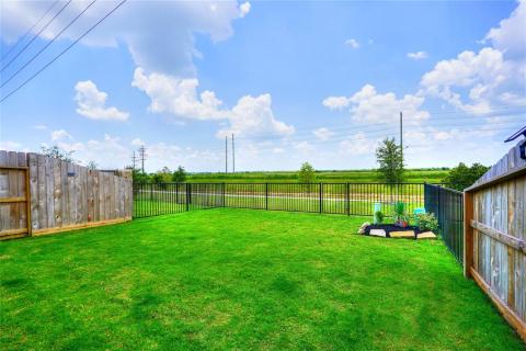 Enjoy the private backyard with no back neighbors and a lovely water view!