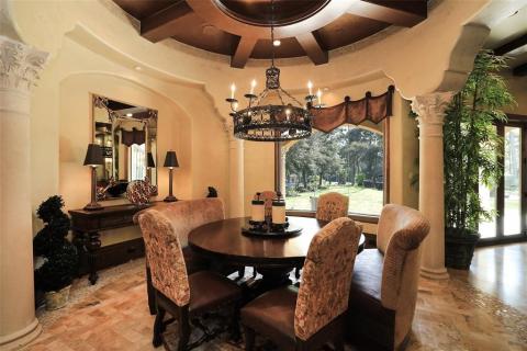 Breakfast area in the rotunda style room that features a sensational wood ceiling, gorgeous columns, & a magnificent view of the backyard oasis! Breakfast area in the rotunda style room that features a sensational wood ceiling, gorgeous columns, & a magnificent view of the backyard oasis!
