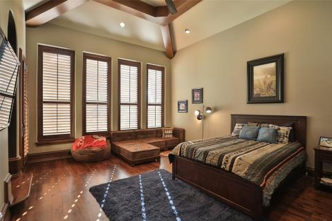 Secondary bedroom upstairs with private step up loft with built-in desk area (not pictured). Phenomenal wood beam ceiling, wood floors & ensuite bath. Door lead to the huge upstairs balcony & outdoor living area that overlooks the expansive grounds Secondary bedroom upstairs with private step up loft with built-in desk area (not pictured). Phenomenal wood beam ceiling, wood floors & ensuite bath. Door lead to the huge upstairs balcony & outdoor living area that overlooks the expansive grounds