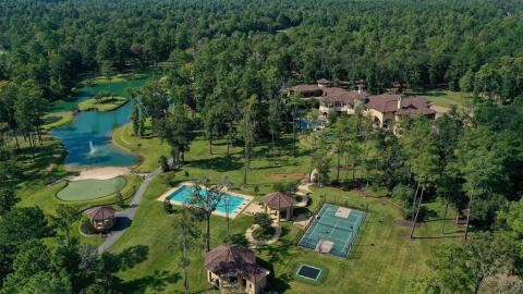 This stunning aerial picture of the perfect lay out of this massive resort like back yard. So many options for entertaining your guests. Numerous places for dining & cooking outdoors! Manicured Zoysia grass throughout the property. This stunning aerial picture of the perfect lay out of this massive resort like back yard. So many options for entertaining your guests. Numerous places for dining & cooking outdoors! Manicured Zoysia grass throughout the property.
