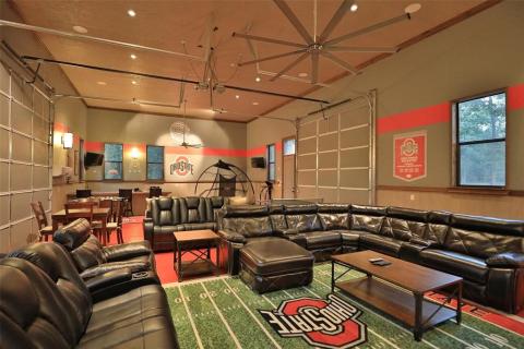 Separate approximate 51x26 man cave features concrete floors, mini fridge, 2 roll up doors & openers to bring the outdoors in on those great fall days! Bring on the football games! Separate approximate 51x26 man cave features concrete floors, mini fridge, 2 roll up doors & openers to bring the outdoors in on those great fall days! Bring on the football games!