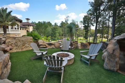 Stunning fire pit area above the cave is complete with beautiful turf grass. Enjoy the phenomenal & tranquil views of the property from this area! Enjoy great conservation & Adult beverages with your guests in this perfect spot! Stunning fire pit area above the cave is complete with beautiful turf grass. Enjoy the phenomenal & tranquil views of the property from this area! Enjoy great conservation & Adult beverages with your guests in this perfect spot!