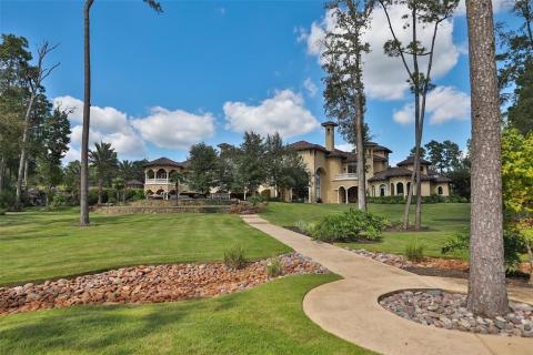 The impressive grounds are complete with sensational golf cart paths throughout the property! No details were missed! The impressive grounds are complete with sensational golf cart paths throughout the property! No details were missed!