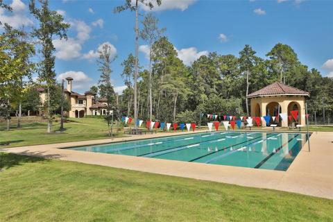 4 lane 25 yard lap pool is also featured at this magnificent property! Perfect for kids on a swim team to get there practice in, or for daily exercise, racing, etc. What a fun back yard! 4 lane 25 yard lap pool is also featured at this magnificent property! Perfect for kids on a swim team to get there practice in, or for daily exercise, racing, etc. What a fun back yard!