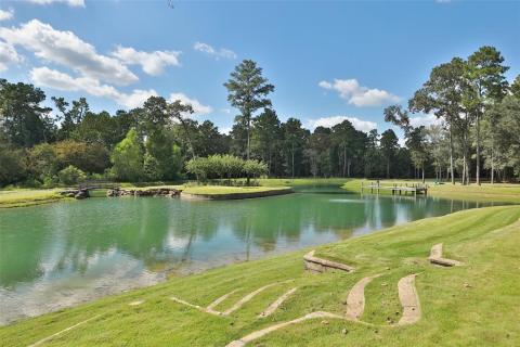 This property has everything you need to be entertained! This 2 1/2 acre pond is stocked with largemouth bass for the fisher in the family! Antique bridge to the island acquired from Spanish Estate. Massive trees create a lush canopy over the manicured grounds. So serene & beautiful! This property has everything you need to be entertained! This 2 1/2 acre pond is stocked with largemouth bass for the fisher in the family! Antique bridge to the island acquired from Spanish Estate. Massive trees create a lush canopy over the manicured grounds. So serene & beautiful!