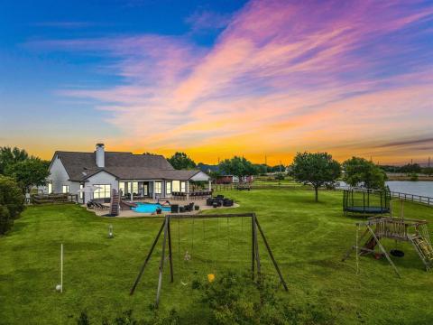 This Stunning Home welcomes you with it's Circular Driveway for additional parking to go with all this land.