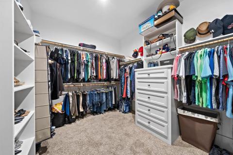 Now this is an Irresistible Super-sized Walk in Closet with built in drawers and shelving. Welcome to Texas where we like it Super Sized!!