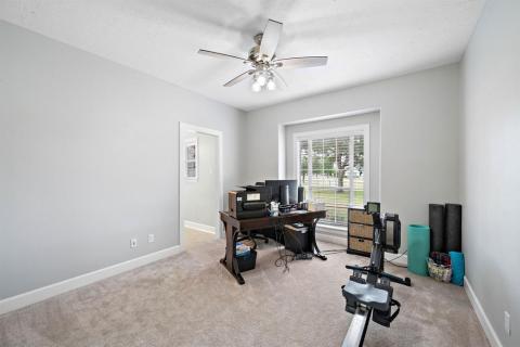 Working from home this secondary bedroom located in the front of the home has view to all the who is coming and going. Still have lots of space for some work out equipement for some "possible" needed de-stressing!!