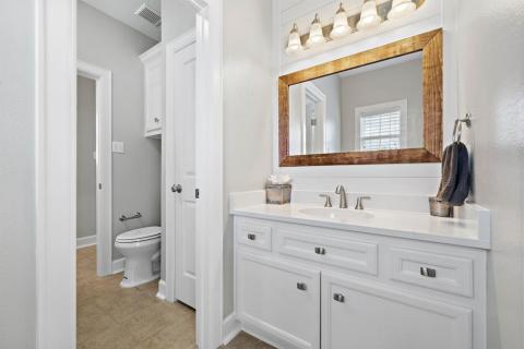 A Jack-n-Jill/Hollywood style bathroom provides lots of visiting and/or privacy!