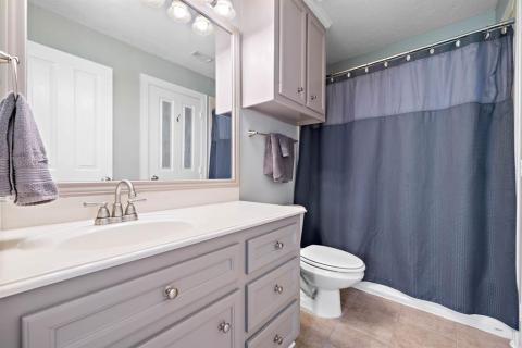 This is the full stylish bathroom that is upstairs.