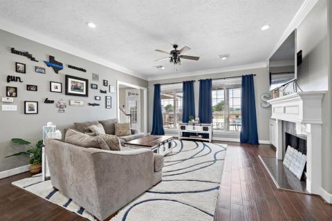 Look at the size of this magnificent Living room with floor to ceiling windows that provides continuous views of the Outdoor oasis.