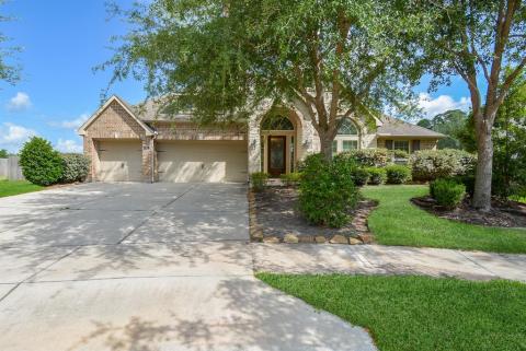What a regal welcome! This inviting double-wide driveway hosts the home's 3-attached garages, with easy parking for both family and guests. Impeccably maintained, inside and out, the home shows proud ownership and impressive curb appeal. Inside, are 4/5 bedrooms; 3-1/2 baths, all sitting on a generous 24,425 square-foot- lot with a remarkable 3,760 square-feet of interior living space.