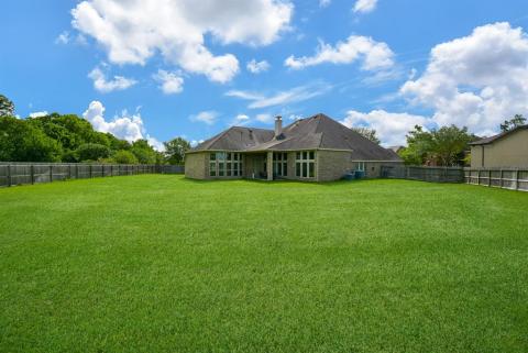 Your huge, private, natural oasis is great for family and friend gatherings! The property is entirely fenced in for added privacy and comfort.