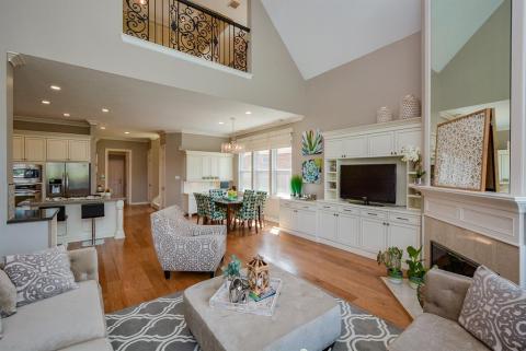 This is one awesome view, combining kitchen, breakfast nook, casual living space, and a peek to the upstairs catwalk. So satisfying!