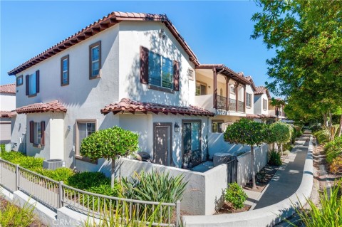 Attractive #5515 Bldg. Casitas at Silver Creek Townhome Community Has Great Curb Appeal. Look For Unit #25 With Upstairs Balcony. Property On Right