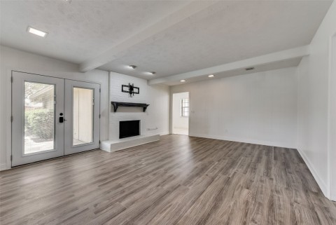 Nice Size Family Area with French Doors & Recessed Lighting