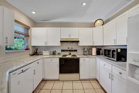 UPDATED CABINETS AND QUARTZ COUNTERS
