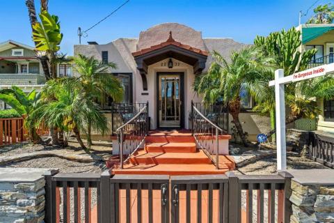 Shows the beautiful roof line and Spanish tiles.