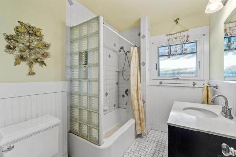 Lovely bathroom with a window that opens.