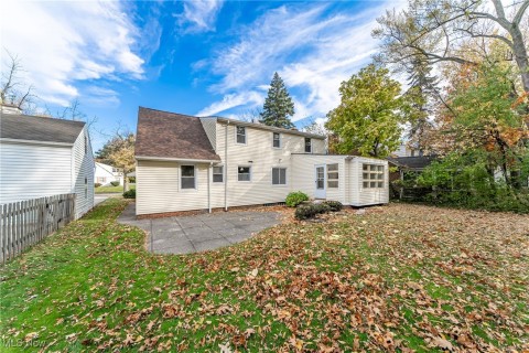 Back of property with a patio area