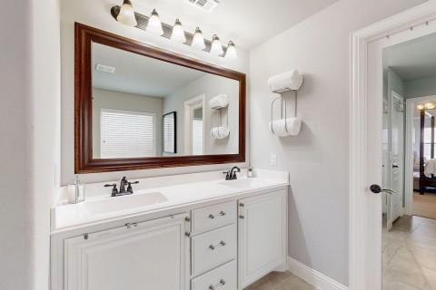 Ensuite bathroom with double vanity.