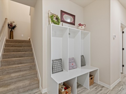 Mudroom with light wood-type flooring