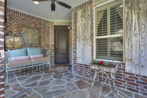 Decorative iron and glass front door.