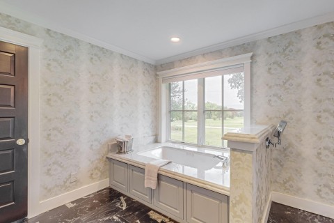 Primary bathroom view 3 Jacuzzi tub, lots of natural light