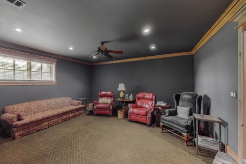 Media room Surround sound with flush mounted wall and ceiling speakers, large equipment closet Hunter lifetime ceiling fan, dimable can lights