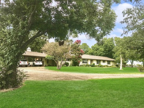 3/3 plus media room and office on over 8 acres