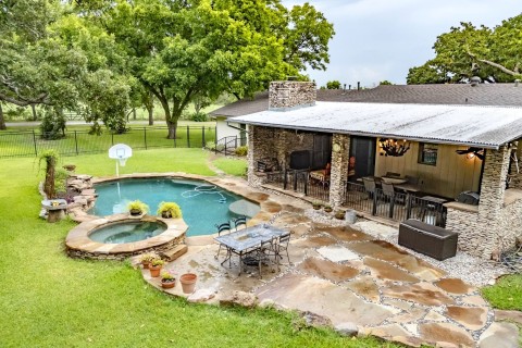 Pool view 3 note huge covered patio, flagstone decking