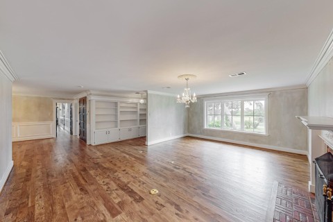 Living room note built ns, faux painted walls, hand scaped Knotty Hickory wood floors