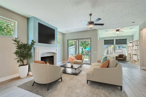 Virtually staged living room and flex room as a study