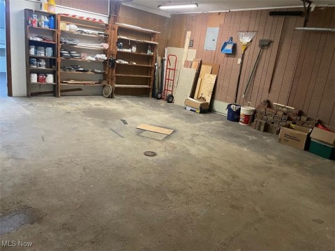 Garage featuring electric panel