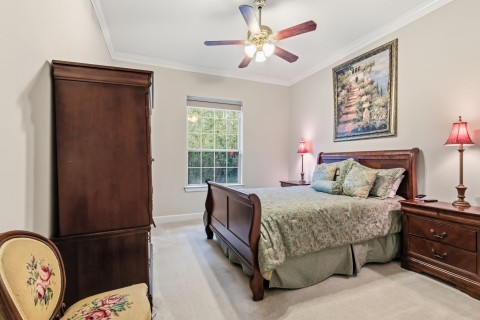 Secondary bedroom with private ensuite, offering spacious comfort and privacy, separated from the primary suite.