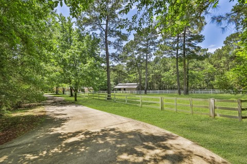 Spacious fenced pasture for your horses. Enjoy having direct access to the riding trails. This property offers a serene and private setting ideal for country living.